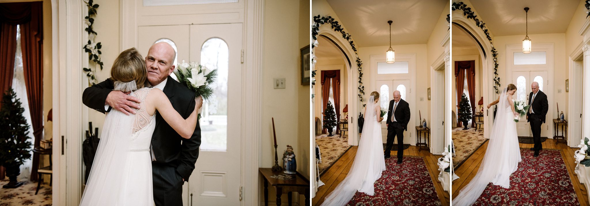 The bride having an emotional first look with her dad in the front foyer of the Larimore House, just before he walks her down the aisle. 