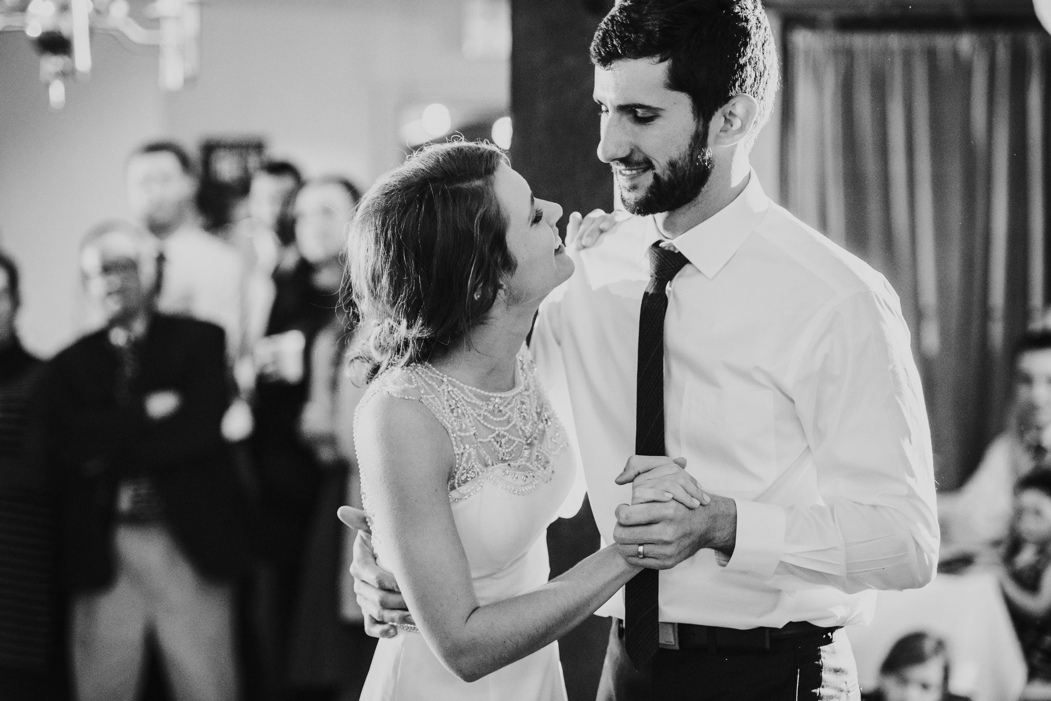The bride and groom's first dance at their reception in the Barn at The Larimore House